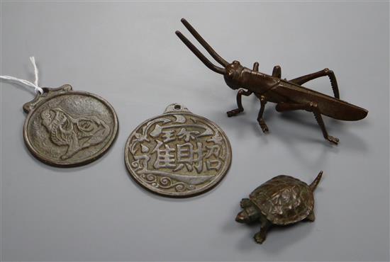 Two bronze pendants - a tortoise and a locust